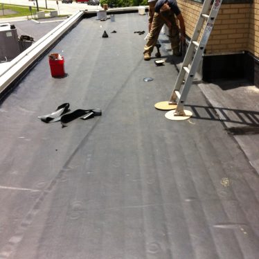 InstallationofnewEPDMroofatStMary27schurchinParma